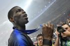 France's Paul Pogba celebrates after his team won 4-2 during the final match between France and Croatia at the 2018 soccer World Cup in the Luzhniki Stadium in Moscow, Russia, Sunday, July 15, 2018. (AP Photo/Martin Meissner)