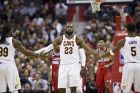 Cleveland Cavaliers forward LeBron James (23) slaps hands with forward Jae Crowder (99) and guard JR Smith (5) after he was fouled during the second half of an NBA basketball game against the Washington Wizards, Friday, Nov. 3, 2017, in Washington. The Cavaliers won 130-122. (AP Photo/Nick Wass)