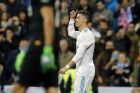 Real Madrid's Cristiano Ronaldo celebrates after scoring during a Spanish La Liga soccer match between Real Madrid and Girona at the Santiago Bernabeu stadium in Madrid, Spain, Sunday, March 18, 2018. (AP Photo/Paul White)