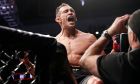 Ο Τόνι Φέργκιουσον πανηγυρίζει τη νίκη του επί του Άντονι Πέτις για τη ζώνη των ελαφριών βαρών στο UFC 229, Λας Βέγκας, Σάββατο 6 Οκτωβρίου 2018