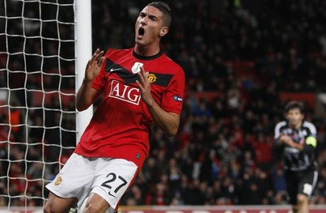 Manchester United's Federico Macheda, left, reacts after a missed opportunity against Besiktas during their Champions League group B soccer match at Old Trafford, Manchester, England, Wednesday Nov. 25, 2009. (AP Photo/Jon Super)