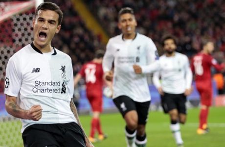 Liverpool's Philippe Coutinho, left, celebrates after scoring during the Champions League soccer match between Spartak Moscow and Liverpool in Moscow, Russia, Tuesday, Sept. 26, 2017. (AP Photo/Ivan Sekretarev)
