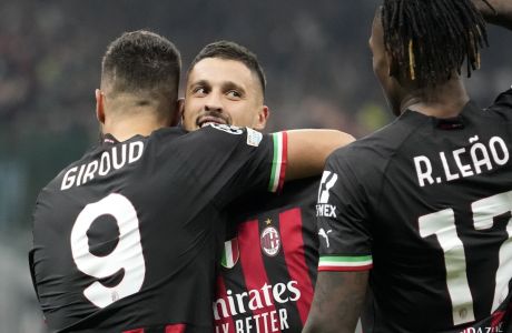 AC Milan's Rade Krunic, center, celebrates with teammates after scoring his side's second goal during the Champions League, Group E soccer match between AC Milan and FC Salzburg, at the San Siro stadium in Milan, Italy, Wednesday, Nov. 2, 2022. (AP Photo/Luca Bruno)