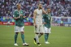 From left, Germany's Julian Brandt goalkeeper Manuel Neuer and Joshua Kimmich walk on the pitch at the end of the group F match between South Korea and Germany, at the 2018 soccer World Cup in the Kazan Arena in Kazan, Russia, Wednesday, June 27, 2018. South Korea won 2-0. (AP Photo/Thanassis Stavrakis)