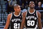 9 Nov 1999: David Robinson #50 of the San Antonio Spurs walks on the court with teammate Tim Duncan #21during a game against the Golden State Warriors at the Oakland Coliseum in Oakland, California. The Spurs defeated the Warriors 118-89.  Mandatory Credit: Jed Jacobsohn  /Allsport