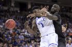 Central Florida center Tacko Fall (24) defends against Duke forward Zion Williamson (1) during the first half of a second-round game in the NCAA men's college basketball tournament Sunday, March 24, 2019, in Columbia, S.C. (AP Photo/Sean Rayford)
