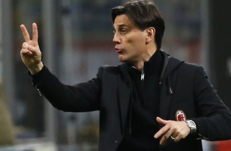 AC Milan coach Vincenzo Montella gives directions to his players during a Serie A soccer match between AC Milan and Genoa, at the San Siro stadium in Milan, Italy, Saturday, March 18, 2017. (AP Photo/Antonio Calanni)