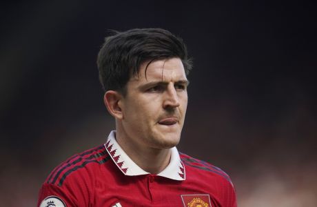 Manchester United's Harry Maguire grimaces during the English Premier League soccer match between Manchester United and Everton, at the Old Trafford stadium in Manchester, England, Saturday, April 8, 2023. (AP Photo/Dave Thompson)