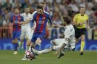 Barcelona's Lionel Messi is fouled by Real Madrid's Sergio Ramos during a Spanish La Liga soccer match between Real Madrid and Barcelona, dubbed 'el clasico', at the Santiago Bernabeu stadium in Madrid, Spain, Sunday, April 23, 2017. (AP Photo/Daniel Ochoa de Olza)