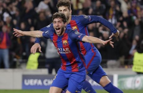 Barcelona's Sergi Roberto celebrates after scoring the sixth goal during the Champion League round of 16, second leg soccer match between FC Barcelona and Paris Saint Germain at the Camp Nou stadium in Barcelona, Spain, Wednesday March 8, 2017. Barcelona won 6-1. (AP Photo/Emilio Morenatti)