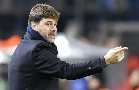 Tottenham coach Mauricio Pochettino ducts his players during the soccer Champions League group H match between Borussia Dortmund and Tottenham Hotspur in Dortmund, Germany, Tuesday, Nov. 21, 2017. (AP Photo/Martin Meissner)