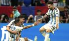 Argentina's Angel Di Maria celebrates after scoring his side's second goal with team mates Lionel Messi, right, and Julian Alvarez during the World Cup final soccer match between Argentina and France at the Lusail Stadium in Lusail, Qatar, Sunday, Dec. 18, 2022. (AP Photo/Frank Augstein)