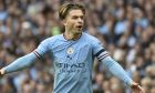 Manchester City's Jack Grealish gestures during the English Premier League soccer match between Manchester City and Manchester United at Etihad stadium in Manchester, England, Sunday, Oct. 2, 2022. (AP Photo/Rui Vieira)