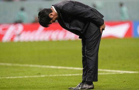 Japan's head coach Hajime Moriyasu bows after losing the penalty shootout of the World Cup round of 16 soccer match between Japan and Croatia at the Al Janoub Stadium in Al Wakrah, Qatar, Monday, Dec. 5, 2022. (AP Photo/Frank Augstein)
