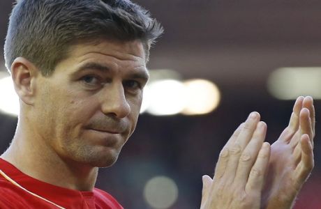 Liverpool's Steven Gerrard acknowledges the crowd after the English Premier League soccer match between Liverpool and Crystal Palace at Anfield Stadium, Liverpool, England, Saturday, May 16, 2015. Gerard played his final home match for Liverpool on Saturday at Anfield after over 700 appearances for the club, before he moves to MLS team LA Galaxy. (AP Photo/Jon Super)    