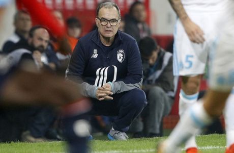 Lille coach Marcelo Bielsa watches the action during their French League one soccer match against Marseille at the Lille Metropole stadium, in Villeneuve d'Ascq, northern France, Sunday, Oct. 29, 2017. (AP Photo/Michel Spingler)