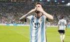 Argentina's Lionel Messi celebrates after scoring his side's opening goal during the World Cup group C soccer match between Argentina and Mexico, at the Lusail Stadium in Lusail, Qatar, Saturday, Nov. 26, 2022. (AP Photo/Ariel Schalit)