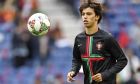 Portugal's Joao Felix warms up prior the UEFA Nations League semifinal soccer match between Portugal and Switzerland at the Dragao stadium in Porto, Portugal, Wednesday, June 5, 2019. (AP Photo/Martin Meissner)