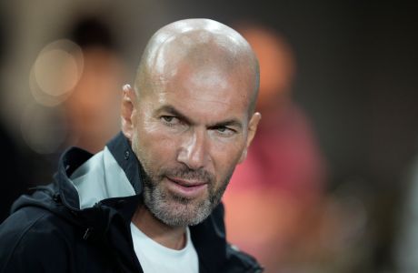 French soccer manager and former player Zinedine Zidane stands in the Inter Miami owner's suite at the start of U.S. Open Cup final soccer match between Inter Miami and Houston Dynamo, Wednesday, Sept. 27, 2023, in Fort Lauderdale, Fla. (AP Photo/Rebecca Blackwell)