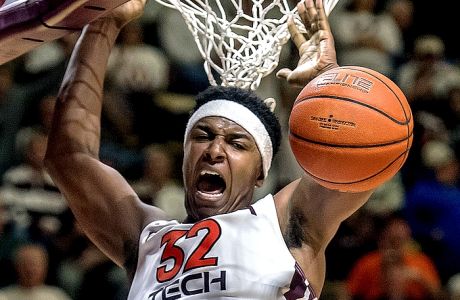 Virginia Tech's Zach LeDay celebrates after dunking the ball against Miami late in the second half of an NCAA college basketball game, Monday Feb. 27, 2017, at Cassell Coliseum in Blacksburg, Va. Virginia Tech won 66-61. (AP Photo/Don Petersen)