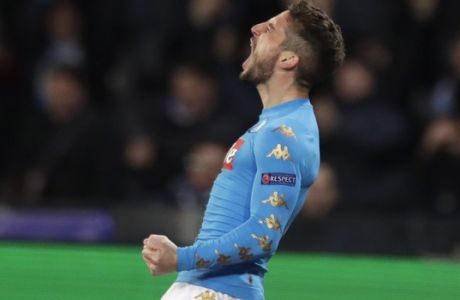 Napoli's Dries Mertens celebrates after scoring the opening goal during the Champions League round of 16, second leg, soccer match between Napoli and Real Madrid at the San Paolo stadium in Naples, Italy, Tuesday March 7, 2017. (AP Photo/Andrew Medichini)