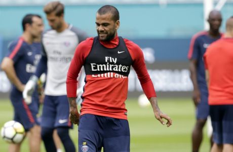 Paris Saint-Germain's Dani Alves practices in advance of an International Champions Cup soccer match, Tuesday, July 25, 2017, in Miami Gardens, Fla. Paris Saint-Germain plays Juventus on Wednesday. (AP Photo/Lynne Sladky)