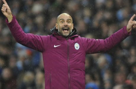 Manchester City manager Josep Guardiola reacts during the English Premier League soccer match between Manchester City and Burnley at Etihad stadium, Manchester, England, Saturday, Oct. 21, 2017. (AP Photo/Rui Vieira)
