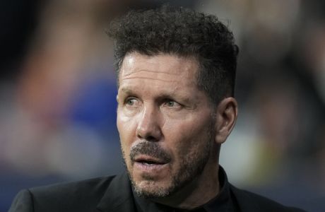 Atletico Madrid's head coach Diego Simeone waits for the start of the group B Champions League soccer match between Atletico Madrid and Bayer 04 Leverkusen at the Civitas Metropolitano stadium in Madrid, Spain, Wednesday, Oct. 26, 2022. (AP Photo/Manu Fernaandez)