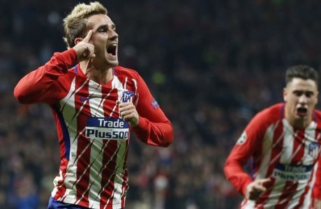 Atletico's Antoine Griezmann celebrates scoring the opening goal during a Champions League group C soccer match between Atletico Madrid and Roma at the Wanda Metropolitano stadium in Madrid, Wednesday, Nov. 22, 2017. (AP Photo/Francisco Seco)