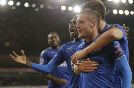 Leicester City's Jamie Vardy celebrates after scoring his sides third goal of the game during their English Premier League soccer match between Arsenal and Leicester City at the Emirates stadium in London, Friday, Aug. 11, 2017. (AP Photo/Alastair Grant)