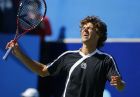 Gustavo Kuerten, of Brazil, reacts after missing a shot against Jan Hernych, of the Czech Republic, during their round-robin match of the Tennis Channel Open tennis tournament in Las Vegas on Thursday, March 1, 2007.  Hernych won 6-4, 6-4.  (AP Photo/Jae C. Hong)
