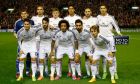The Real Madrid team pose for a group photo before the Champions League group B soccer match between Liverpool and Real Madrid at Anfield Stadium, Liverpool, England, Wednesday Oct. 22, 2014. (AP Photo/Jon Super)  