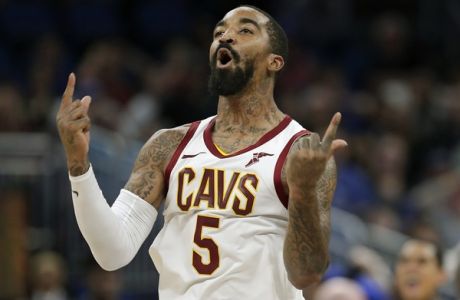 Cleveland Cavaliers' J.R. Smith celebrates after making a 3-point shot against the Orlando Magic during the second half of an NBA basketball game, Monday, Nov. 5, 2018, in Orlando, Fla. (AP Photo/John Raoux)