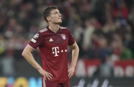 Bayern's Benjamin Pavard reacts to his team's loss end the Champions League, second leg, quarterfinal soccer match between Bayern Munich and Villareal at the Allianz Arena, in Munich, Germany, Tuesday, April 12, 2022. (AP Photo/Matthias Schrader)