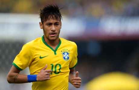 SAO PAULO, BRAZIL - JUNE 06:  Neymar  of Brazil in action during the International Friendly Match between Brazil and Serbia at Morumbi Stadium on June 06, 2014 in Sao Paulo, Brazil.  (Photo by Buda Mendes/Getty Images)