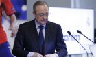 Real Madrid's President Florentino Perez looks down during the presentation of Newly signed Real Madrid soccer player Brahim Diaz at the Bernabeu stadium in Madrid, Spain, Monday, Jan. 7, 2019. Real Madrid has signed Brahim Diaz from Manchester City after the 19-year-old winger failed to get enough first-team opportunities at the Premier League champions. Madrid announced the arrival of Diaz on Sunday, saying he signed a contract until 2025. (AP Photo/Manu Fernandez)