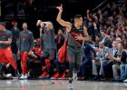 Portland Trail Blazers guard CJ McCollum reacts after making a 3-point basket against the Oklahoma City Thunder during the first half of an NBA basketball game in Portland, Ore., Thursday, March 7, 2019. (AP Photo/Craig Mitchelldyer)