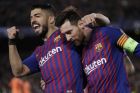 Barcelona's Lionel Messi, right and Barcelona's Luis Suarez celebrate after Messi scored his side's third goal during the Champions League round of 16, 2nd leg, soccer match between FC Barcelona and Olympique Lyon at the Camp Nou stadium in Barcelona, Spain, Wednesday, March 13, 2019. (AP Photo/Emilio Morenatti)