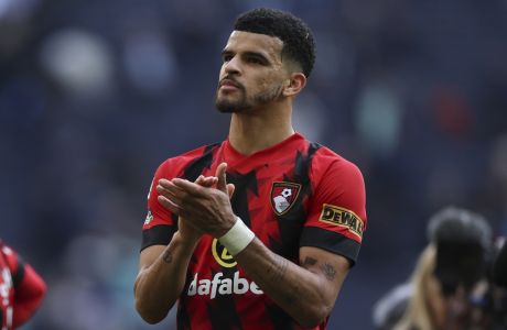 Bournemouth's Dominic Solanke celebrates their team's 3-2 victory over Tottenham Hotspur at the end of the English Premier League soccer match between Tottenham Hotspur and Bournemouth at Tottenham Hotspur Stadium, in London, England, Saturday, April 15, 2023. (AP Photo/Ian Walton)