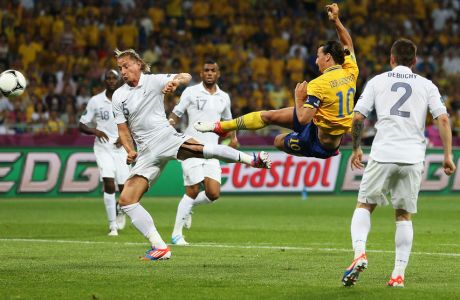 KIEV, UKRAINE - JUNE 19: Zlatan Ibrahimovic of Sweden scores the opening goal during the UEFA EURO 2012 group D match between Sweden and France at The Olympic Stadium on June 19, 2012 in Kiev, Ukraine.  (Photo by Julian Finney/Getty Images)