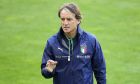 FILE - Italy's head coach Roberto Mancini talks to his players during a training session prior the UEFA Nations League soccer match between Germany and Italy in Moenchengladbach, Germany, Monday, June 13, 2022. Italy and England kick off their European Championship qualifying campaign against each other on Thursday, March 23, 2023. (AP Photo/Martin Meissner, File)