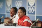 American Athletes Florence Griffith Joyner and her husband and coach, Al Joyner, Saturday, Sept. 17, 1988 in Seoul for the Olympic Games, smiles during a press conference. (AP Photo/Mark Duncan)