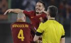 Roma's Kostas Manolas and Radja Nainggolan celebrate their side's 1-0 win at the end of a Champions League round of 16 second-leg soccer match between Roma and Shakhtar Donetsk, at the Rome Olympic stadium, Tuesday, March 13, 2018. (AP Photo/Gregorio Borgia)