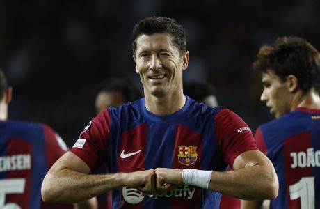 Barcelona's Robert Lewandowski celebrates after scoring his side's second goal during the Champions League Group H soccer match between Barcelona and Royal Antwerp at the Olympic Stadium of Montjuic in Barcelona, Spain, Tuesday, Sept. 19, 2023. (AP Photo/Joan Monfort)