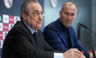 President of Real Madrid Florentino Perez, left, speaks as he is flanked by Zinedine Zidane during a press conference in Madrid, Spain, Thursday, May 31, 2018. Zidane quit as Real Madrid coach on Thursday, less than a week after leading the team to its third straight Champions League title, saying the club needed a change in command. (AP Photo/Borja B. Hojas)