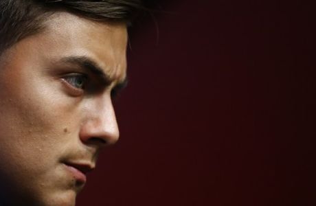 Juventus' Paulo Dybala attends a press conference at the Camp Nou stadium in Barcelona, Spain, Monday, Sept. 11, 2017. FC Barcelona will play against Juventus in a Champions League Group D soccer match on Tuesday. (AP Photo/Manu Fernandez)