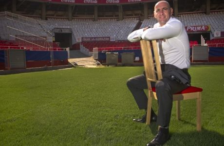In this Thursday, Oct. 6, 2011 photo, Ramon Rodriguez Verdejo "Monchi" poses for a photo at the Ramon Sanchez Pizjuan stadium, in Seville, Spain. Verdejo, who still goes by the nickname from his goalkeeping days, has become one of the most sought-after football directors in European soccer after revolutionizing Spanish club Sevilla with a scouting system that helped rescue the team from the brink of financial collapse and turned it into a perennial contender in the continents second-tiered competitions. (AP Photo/Miguel Angel Morenatti)