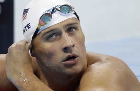 FILE - In this Tuesday, Aug. 9, 2016, file photo, United States' Ryan Lochte checks his time in a men's 4x200-meter freestyle heat during the swimming competitions at the 2016 Summer Olympics, in Rio de Janeiro, Brazil. Add two fresh entries to the increasingly popular genre of non-apology apologies. In a span of 15 hours, politician Donald Trump and Lochte both coughed up carefully crafted words of contrition, each without fully owning up to exactly what hed done wrong. (AP Photo/Michael Sohn, File)