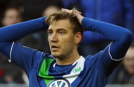 Wolfburg's Nicklas Bendtner from Denmark   looks on during the German first division Bundesliga soccer match between FC Augsburg and VfL Wolfsburg in the SGL Arena in Augsburg, Germany, on Saturday, March 7, 2015. (AP Photo/Matthias Schrader)