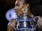 United States' Serena Williams holds her trophy after defeating her sister Venus during their women's singles final at the Australian Open tennis championships in Melbourne, Australia, Saturday, Jan. 28, 2017. (AP Photo/Aaron Favila)